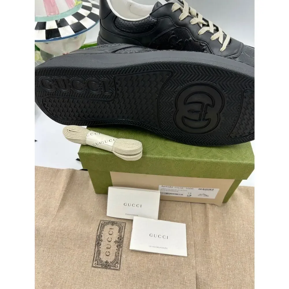 Men's Gucci, GG embossed leather sneakers size 13 fits 13.5 US made in Italy